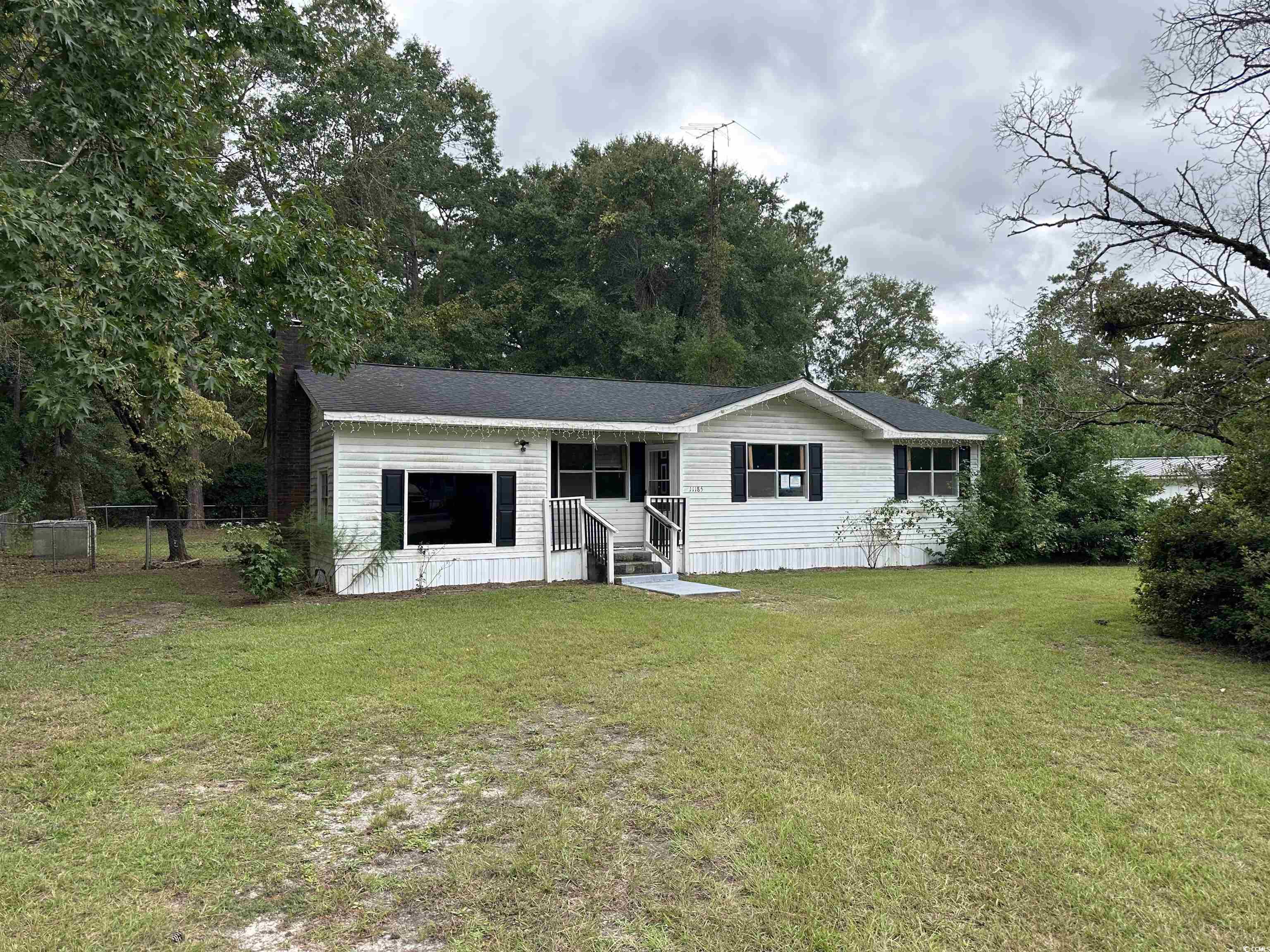 11185 Old Pee Dee Road Hemingway, SC 29554 - Photo 1 of 15 Manufactured / mobile home with covered porch