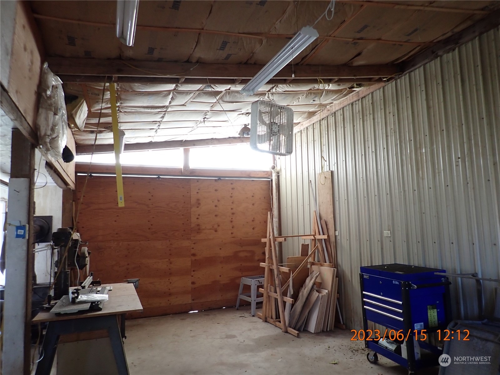 17940 Mi Lane Southwest Rochester, WA 98579 - Photo 19 of 39 a room with wooden walls and furniture