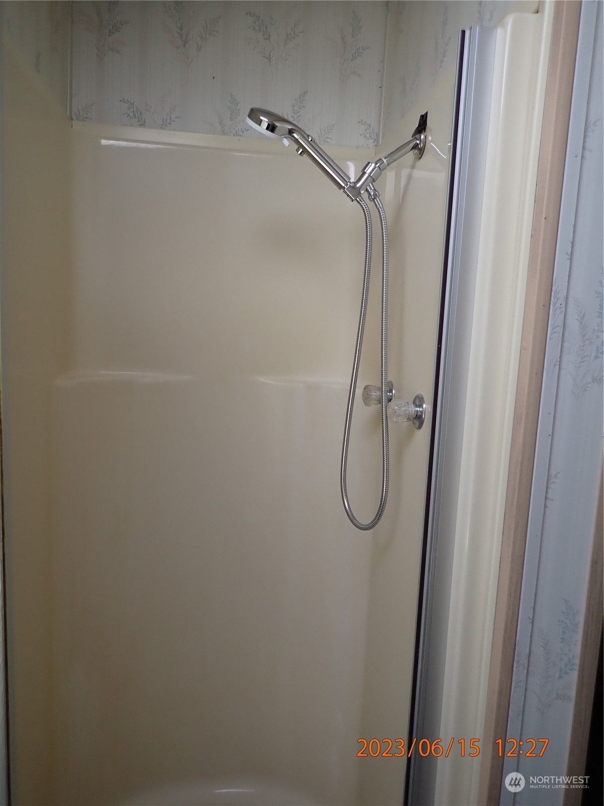 17940 Mi Lane Southwest Rochester, WA 98579 - Photo 31 of 39 a bathroom with a glass shower door