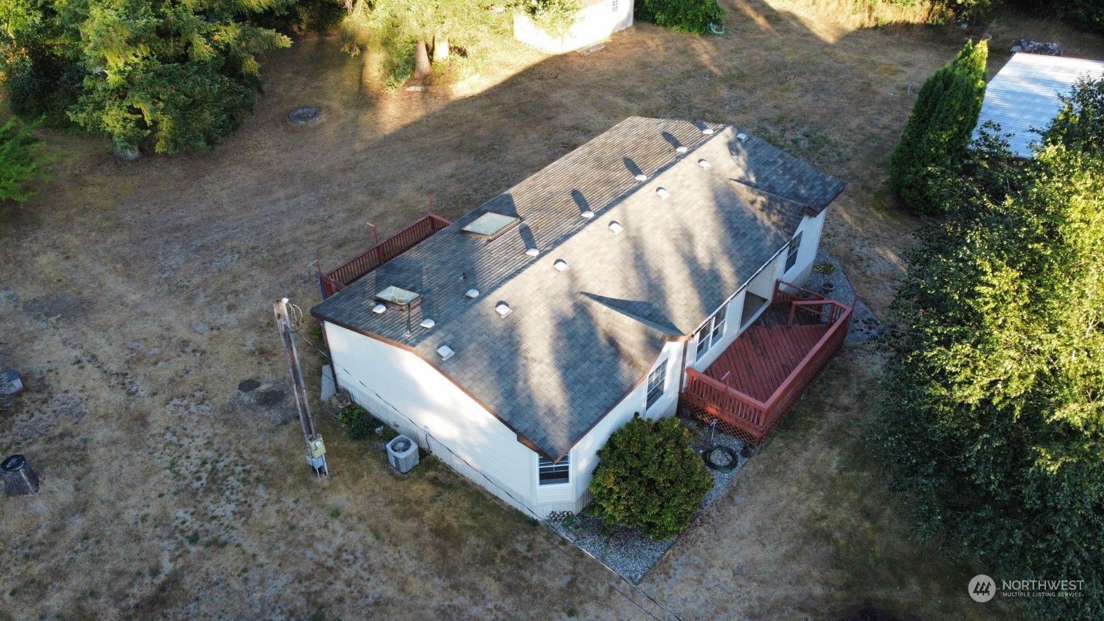17940 Mi Lane Southwest Rochester, WA 98579 - Photo 5 of 39 an aerial view of a house with a yard and trees