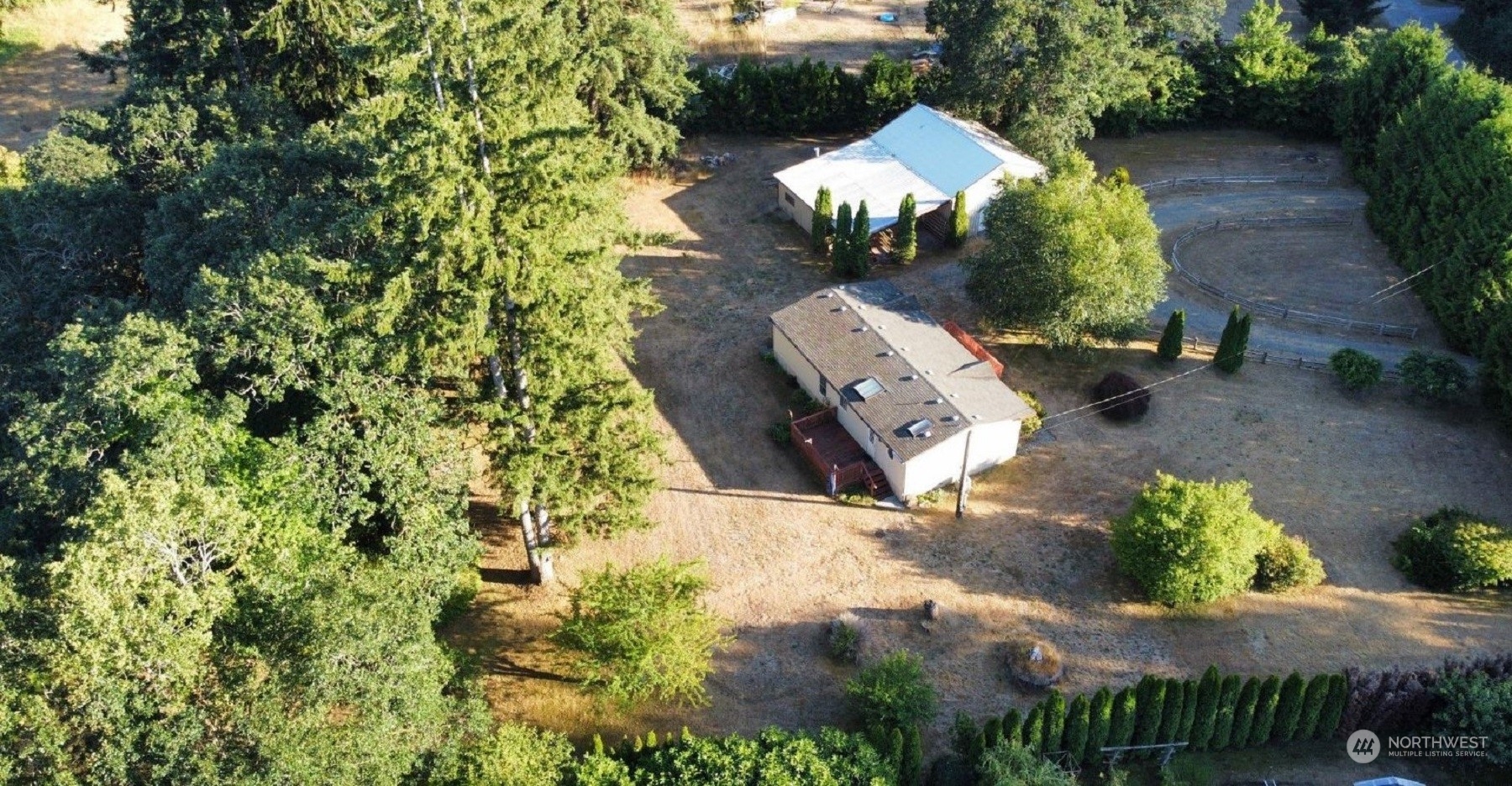 17940 Mi Lane Southwest Rochester, WA 98579 - Photo 8 of 39 an aerial view of a house with a yard and outdoor seating