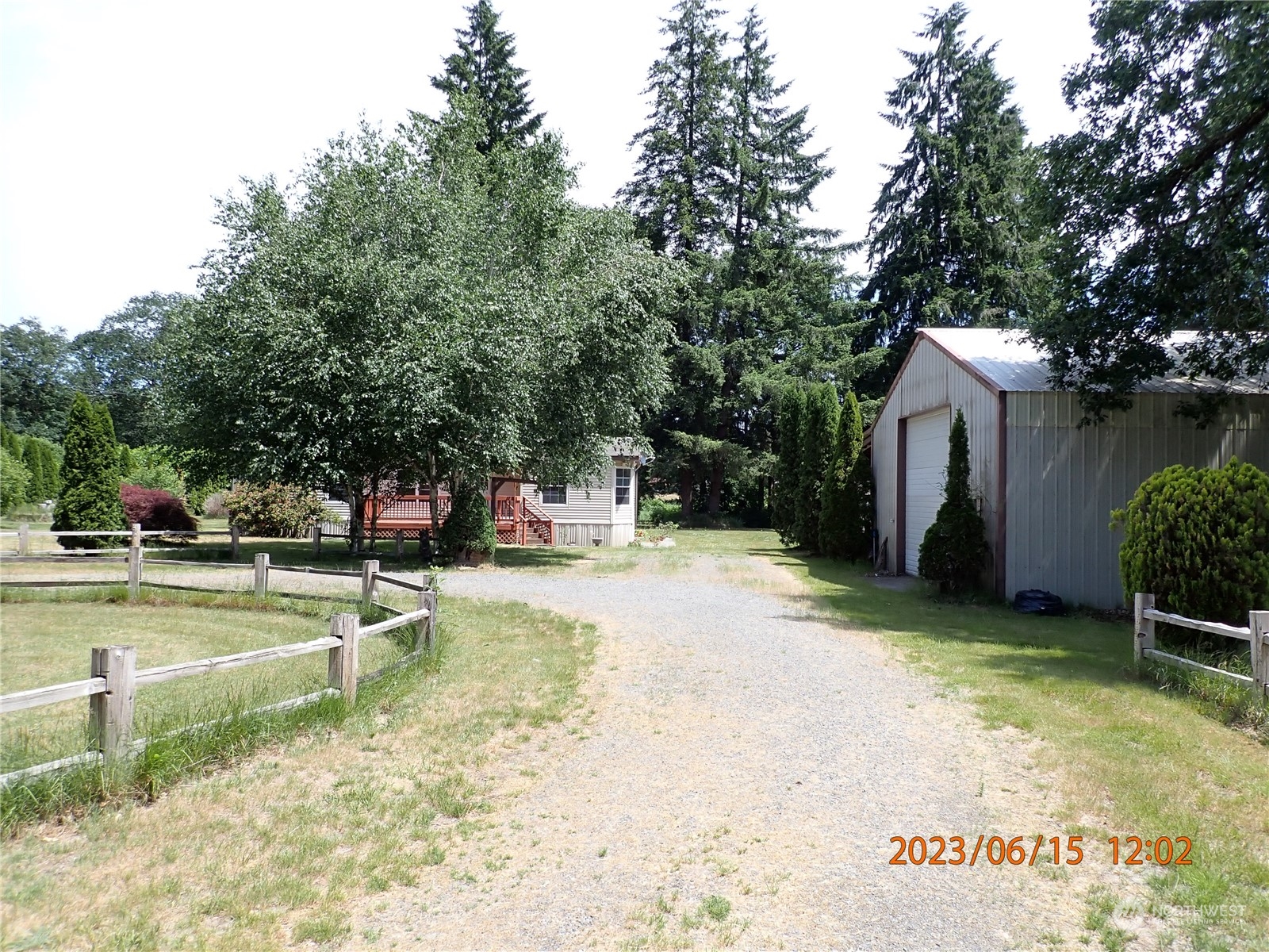 17940 Mi Lane Southwest Rochester, WA 98579 - Photo 9 of 39 a view of a house with swimming pool and sitting area