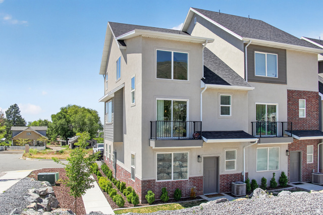 2811 South Orch Hl Lane Perry, UT 84302 - Photo 1 of 18 Contemporary multi-story exterior with a combination of stucco and brick siding