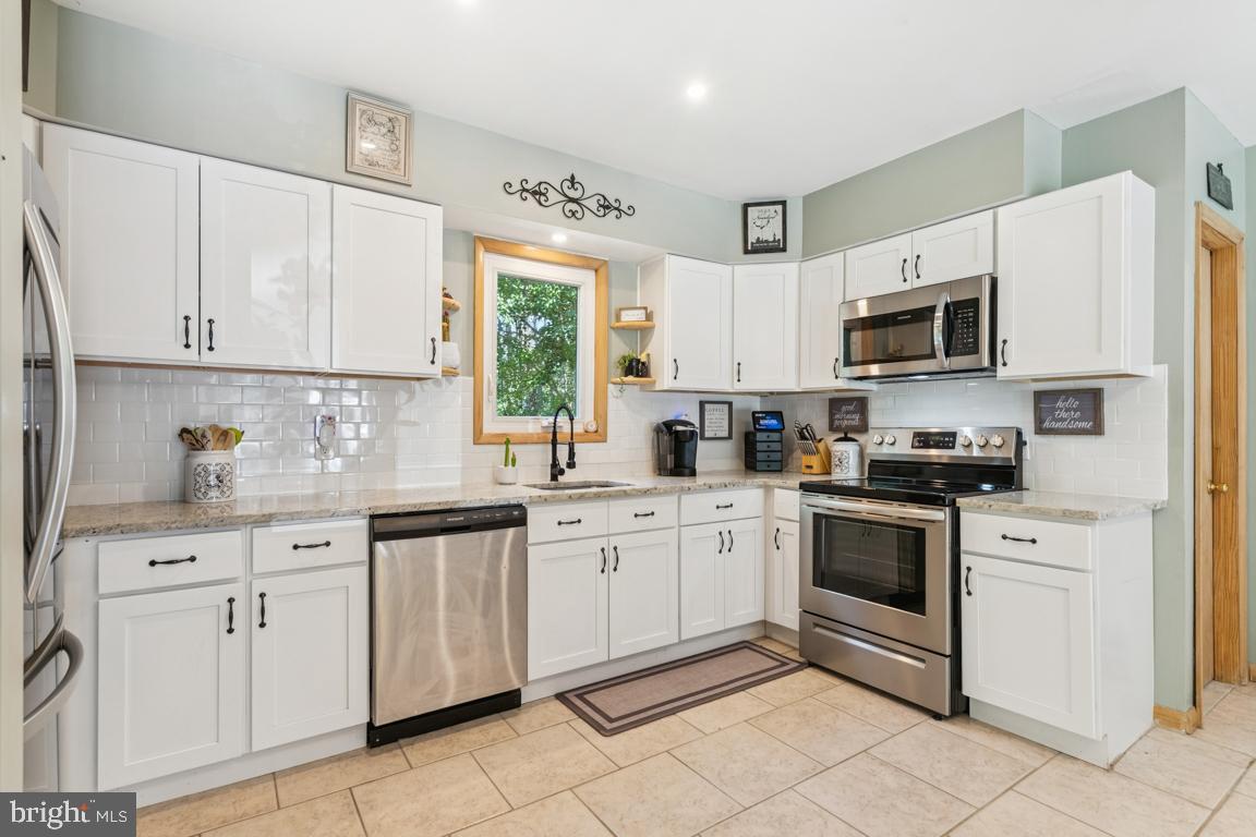 29 Panama Road Chatsworth, NJ 08019 - Photo 6 of 31 Stylish lighting and open sightlines