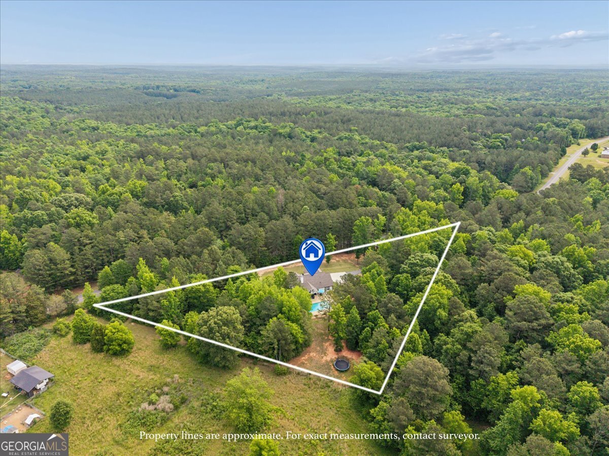 683 Teagle Road Forsyth, GA 31029 - Photo 2 of 50 a view of a city