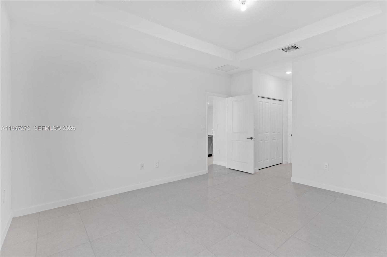 11947 Southwest 241 Terrace Homestead, FL 33032 - Photo 17 of 32 a view of an empty room