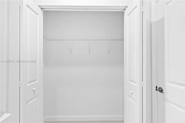 a bathroom with a shower and toilet