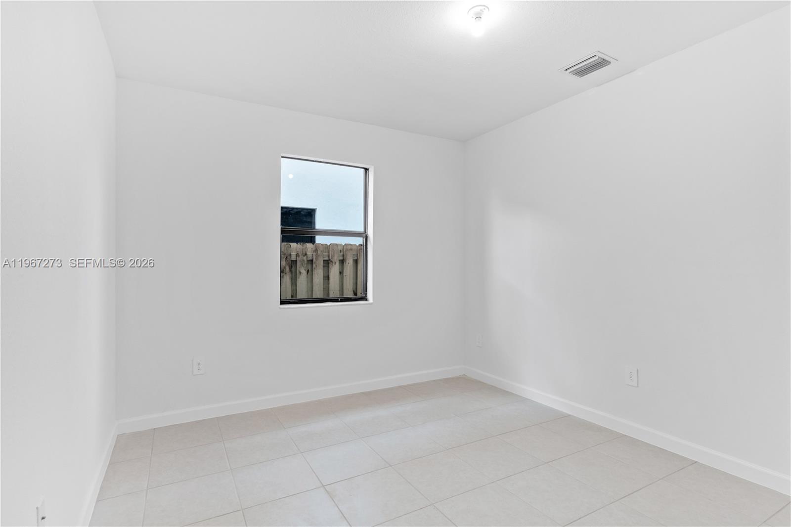 11947 Southwest 241 Terrace Homestead, FL 33032 - Photo 26 of 32 a view of an empty room