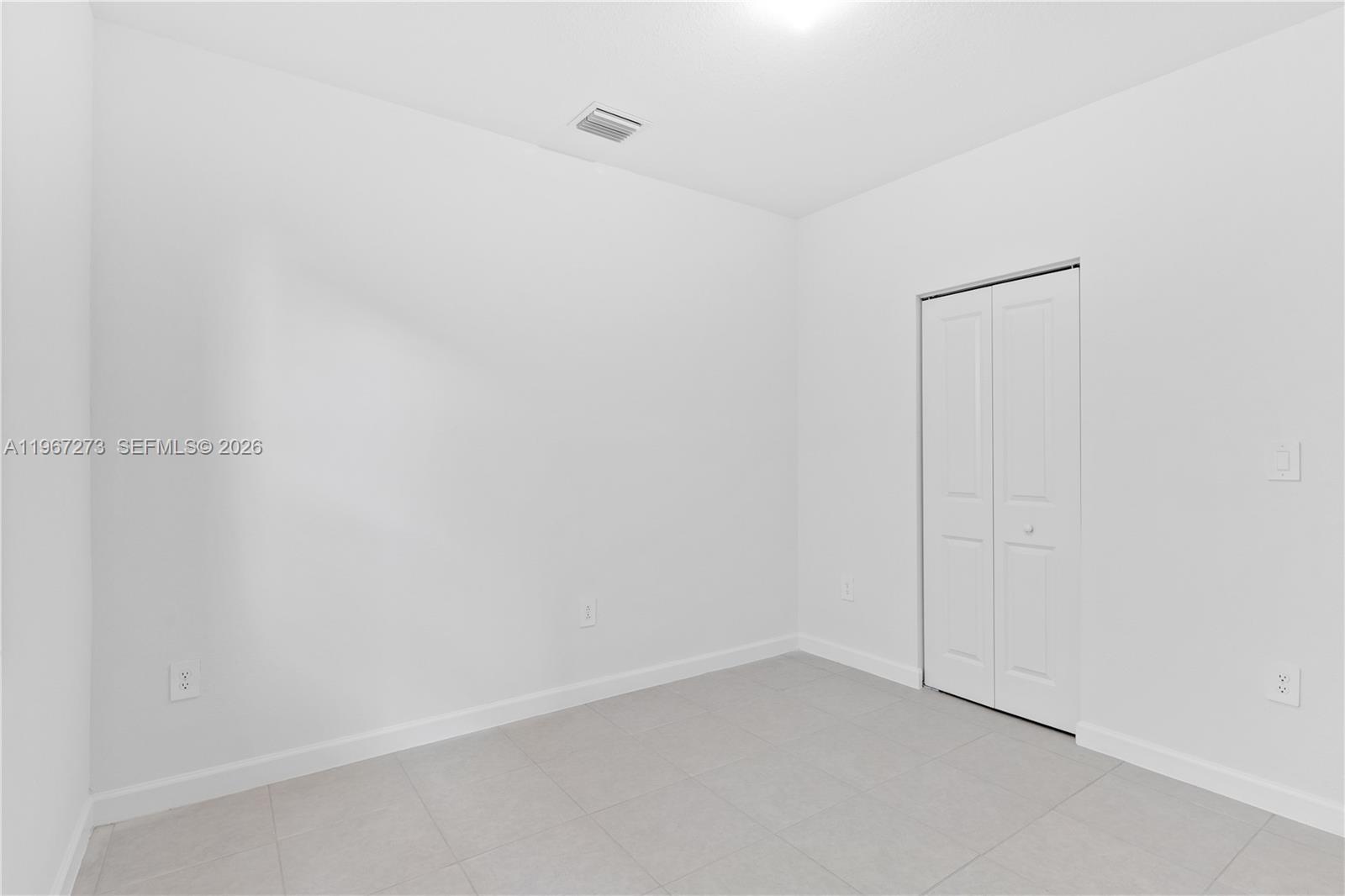 11947 Southwest 241 Terrace Homestead, FL 33032 - Photo 27 of 32 a view of an empty room