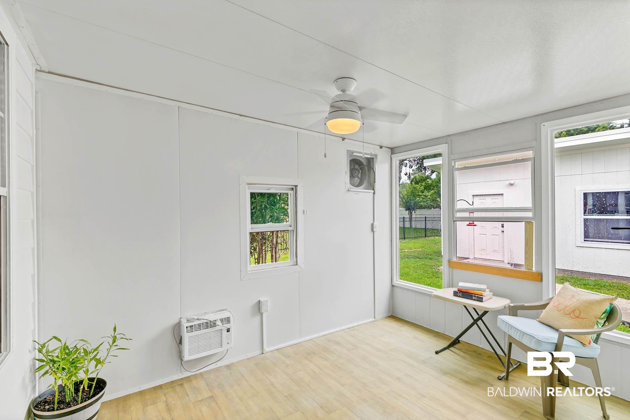 516 Juniper Place Drive Foley, AL 36535 - Photo 33 of 51 Sunroom with AC unit
