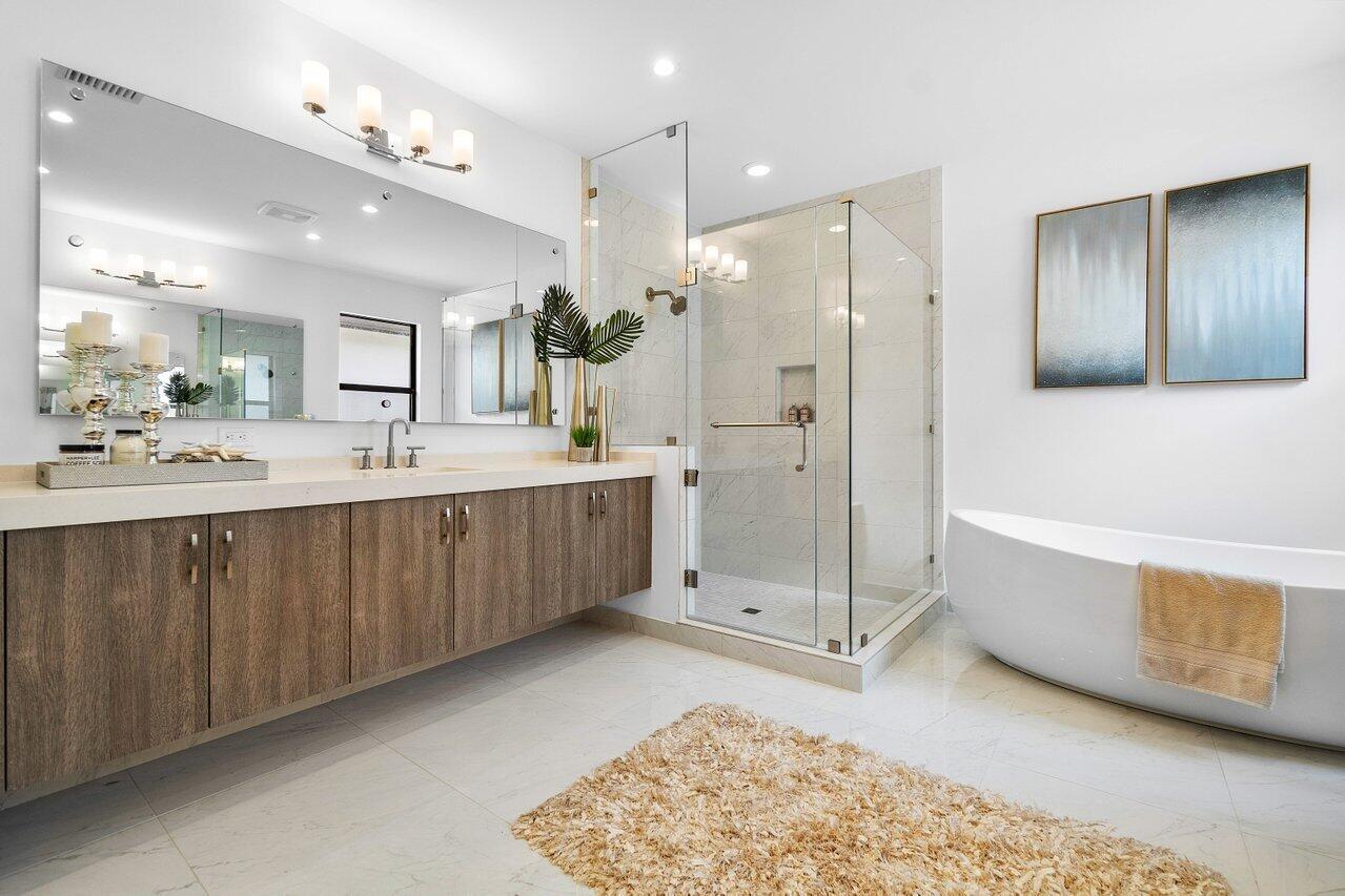 17128 Watersprite Lakes Road Boca Raton, FL 33496 - Photo 22 of 56 a bathroom with a double vanity sink mirror and double