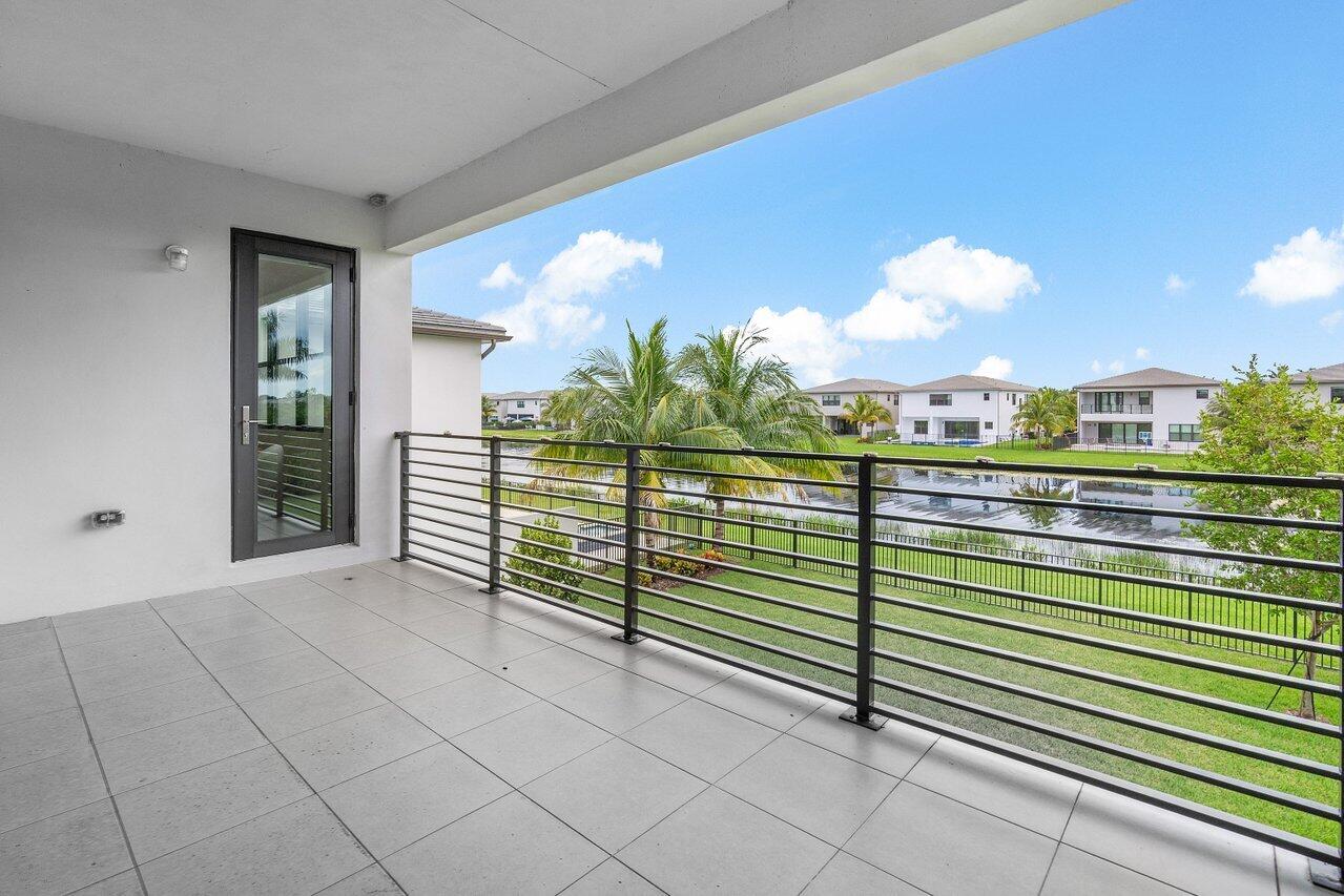 17128 Watersprite Lakes Road Boca Raton, FL 33496 - Photo 35 of 56 a view of a balcony with an outdoor space