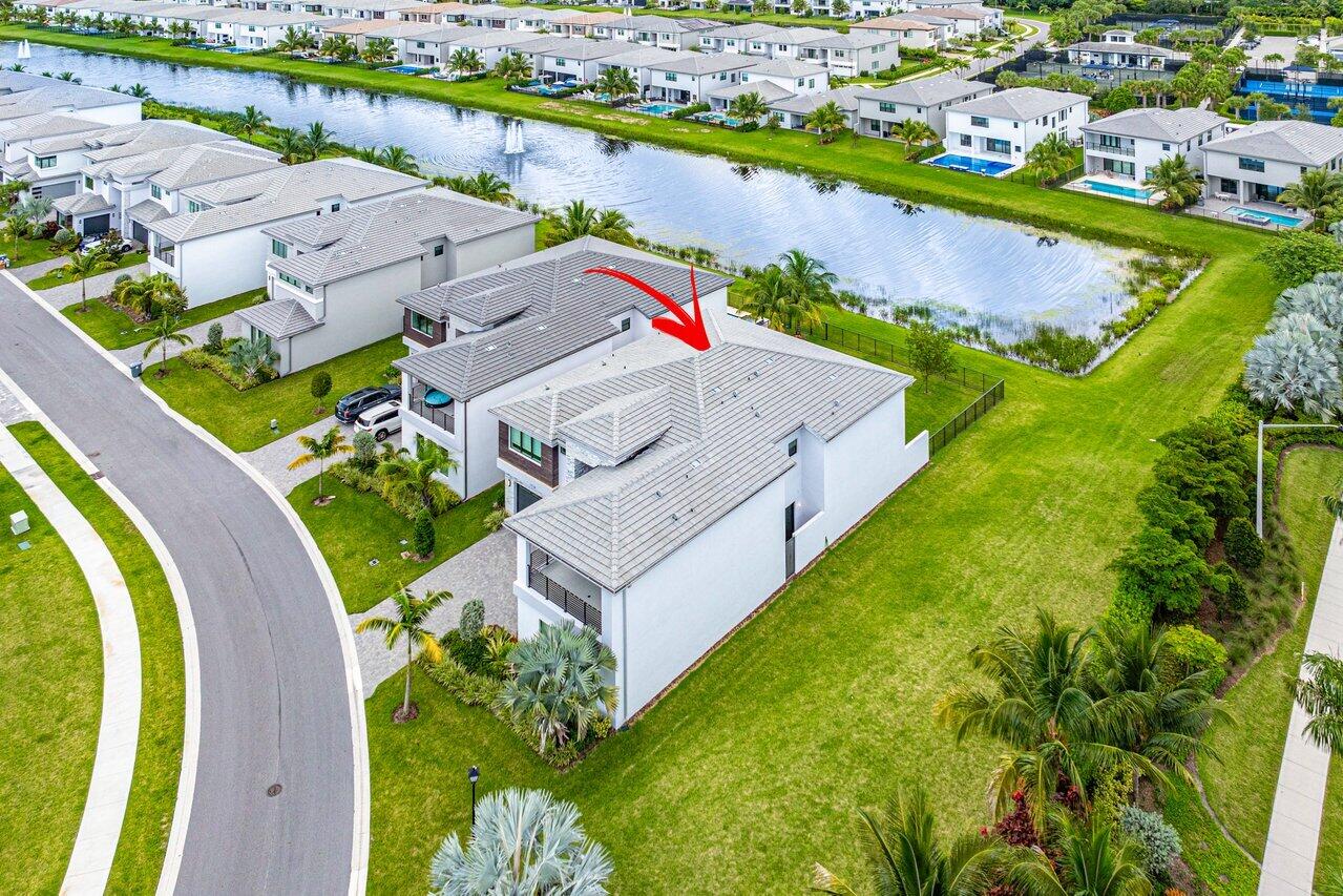 17128 Watersprite Lakes Road Boca Raton, FL 33496 - Photo 46 of 56 an aerial view of a house with a lake view