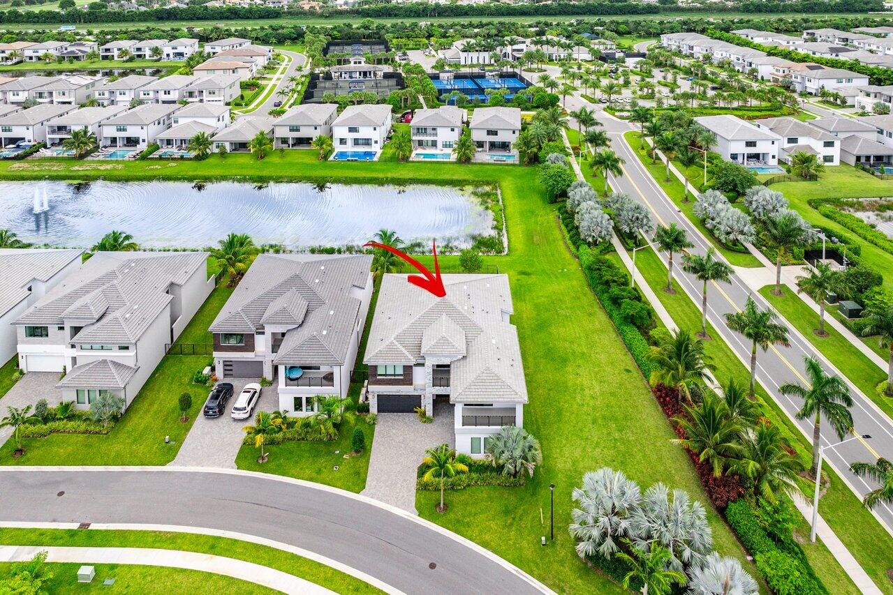 17128 Watersprite Lakes Road Boca Raton, FL 33496 - Photo 52 of 56 an aerial view of multiple houses with yard
