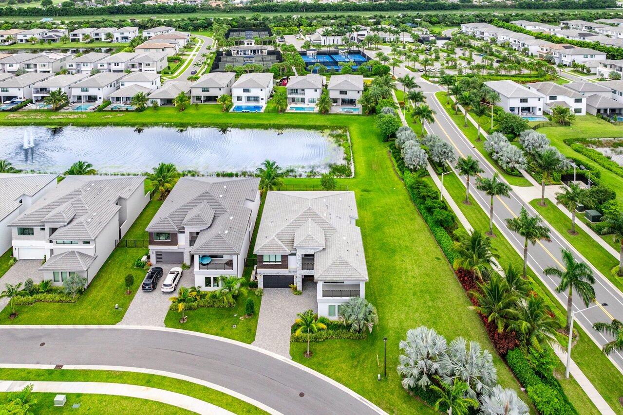 17128 Watersprite Lakes Road Boca Raton, FL 33496 - Photo 53 of 56 an aerial view of residential houses with outdoor space and swimming pool