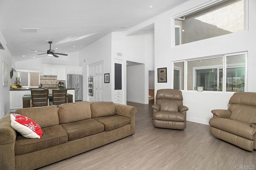 1237 Granada Way San Marcos, CA 92078 - Photo 11 of 27 a living room with furniture kitchen view and a window