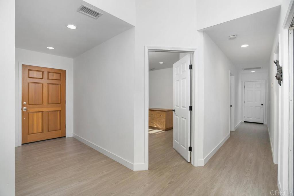 1237 Granada Way San Marcos, CA 92078 - Photo 15 of 27 an empty room with closet and wooden floor