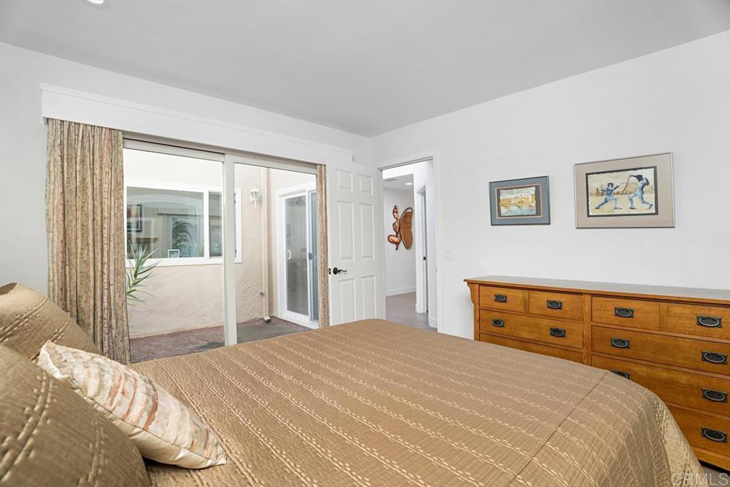 1237 Granada Way San Marcos, CA 92078 - Photo 18 of 27 a bedroom with a bed and a window