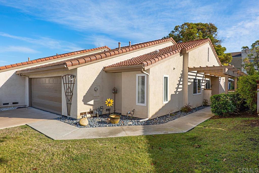 1237 Granada Way San Marcos, CA 92078 - Photo 2 of 27 a view of a house with a yard