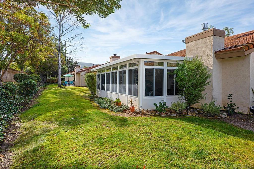 1237 Granada Way San Marcos, CA 92078 - Photo 24 of 27 a view of a house with a yard and sitting area
