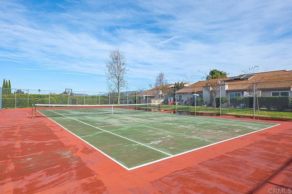 1237 Granada Way San Marcos, CA 92078 - Photo 27 of 27 a view of an outdoor space and tennis court