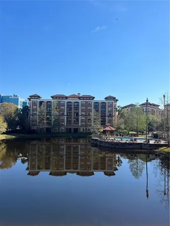 a view of a city with a lake