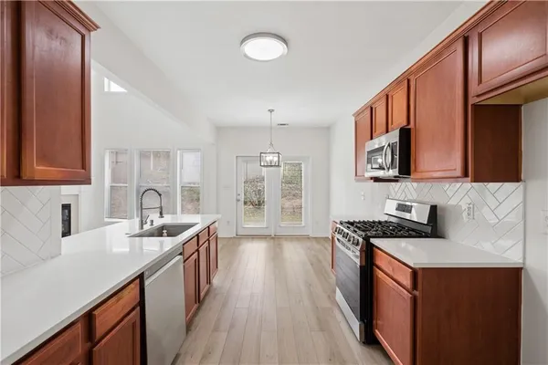 $460,000 | 547 Bridgeton Cove Northeast, Suwanee, GA 30024