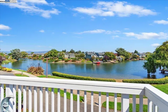 a view of a lake from a balcony