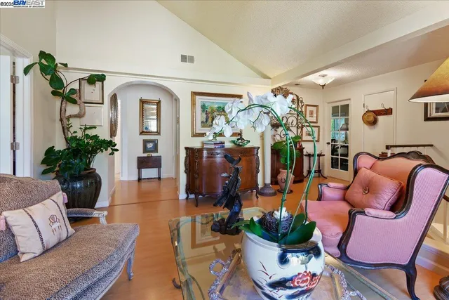 a bedroom with a bed and a fireplace