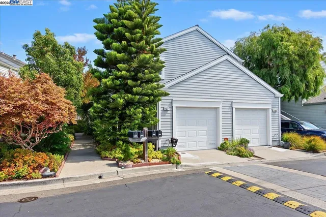 front view of a house with a small yard