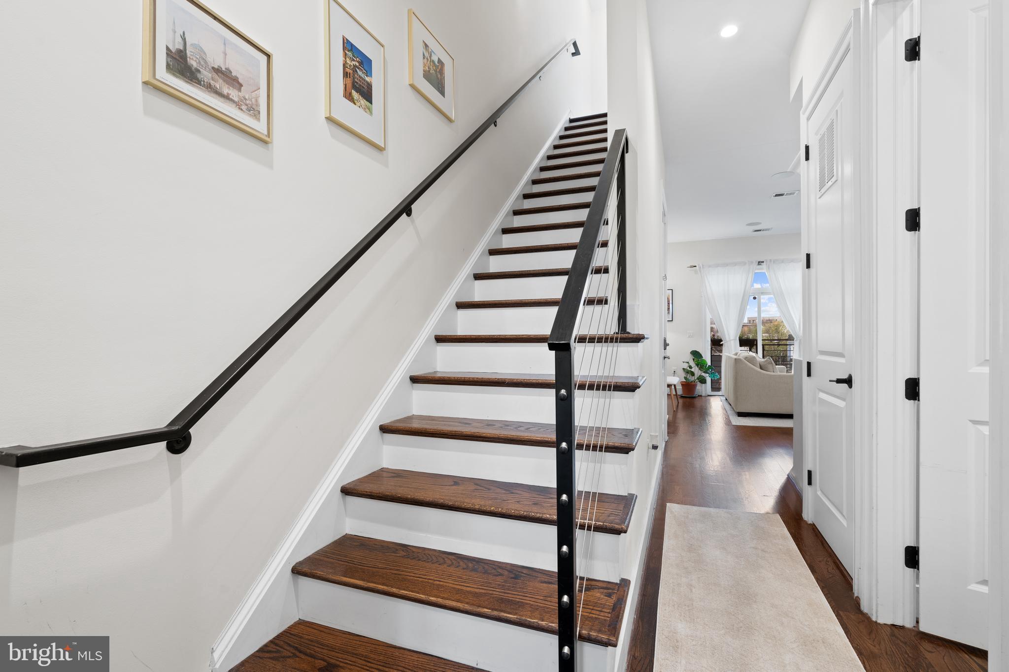 913 12th Street Northeast, Unit 4 Washington, DC 20002 - Photo 22 of 33 a view of entryway and hall with wooden floor