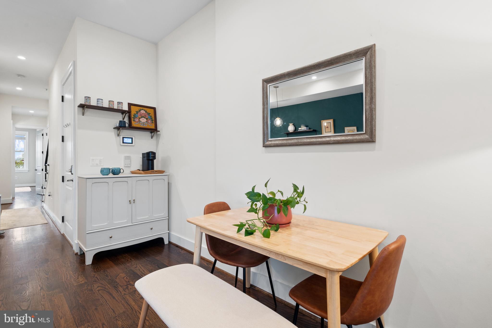913 12th Street Northeast, Unit 4 Washington, DC 20002 - Photo 8 of 33 a room with furniture and wooden floor