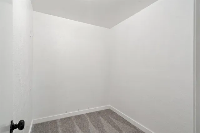 a bathroom with a sink toilet vanity and shower