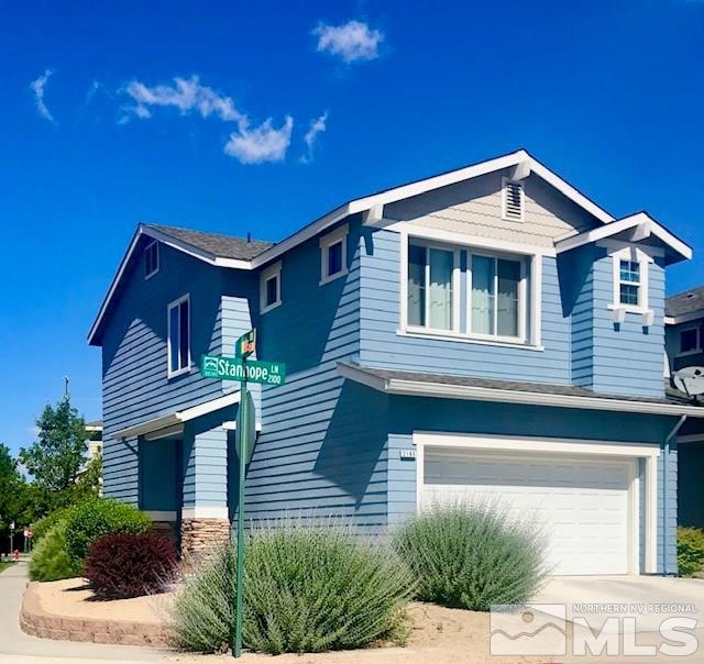 2185 Stanhope Lane Reno, NV 89502 - Photo 1 of 12 a front view of a house with a yard