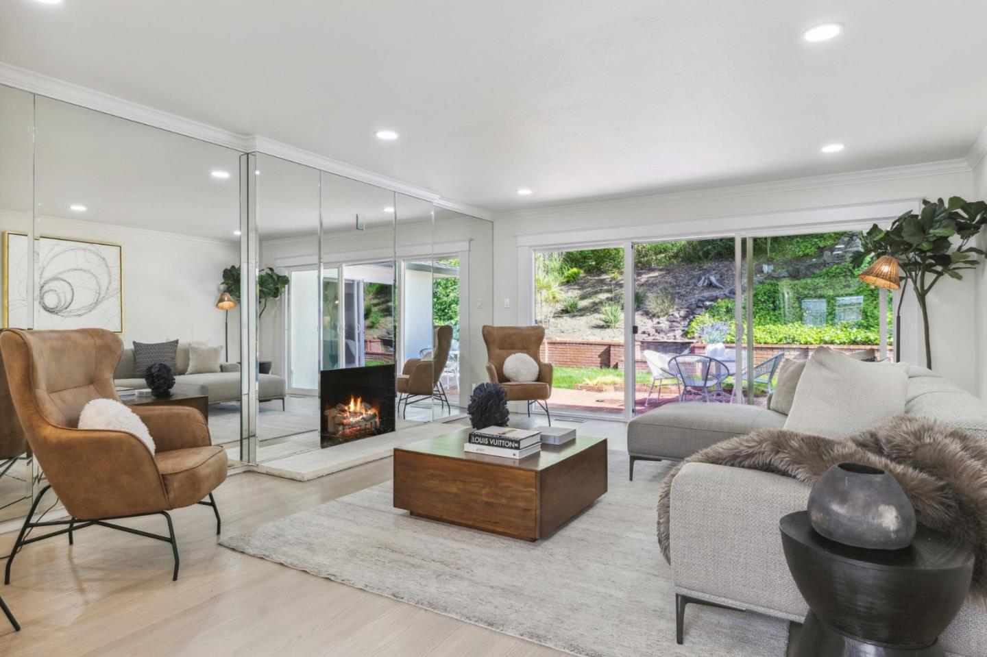 1225 Roble Road Millbrae, CA 94030 - Photo 17 of 42 a living room with furniture and a large window