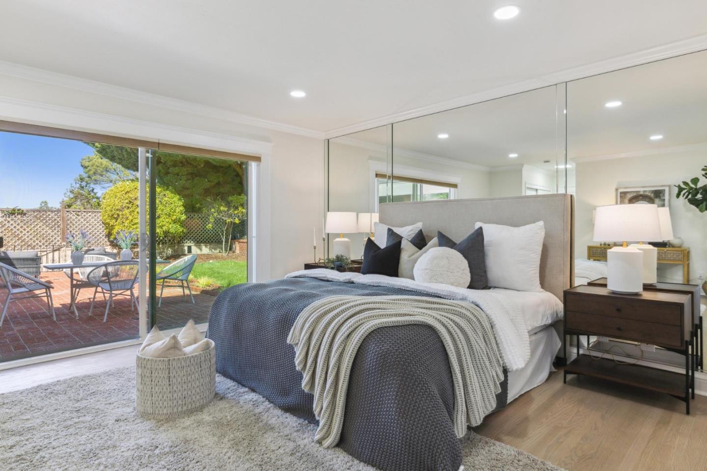 1225 Roble Road Millbrae, CA 94030 - Photo 19 of 42 a large bedroom with a bed and large window