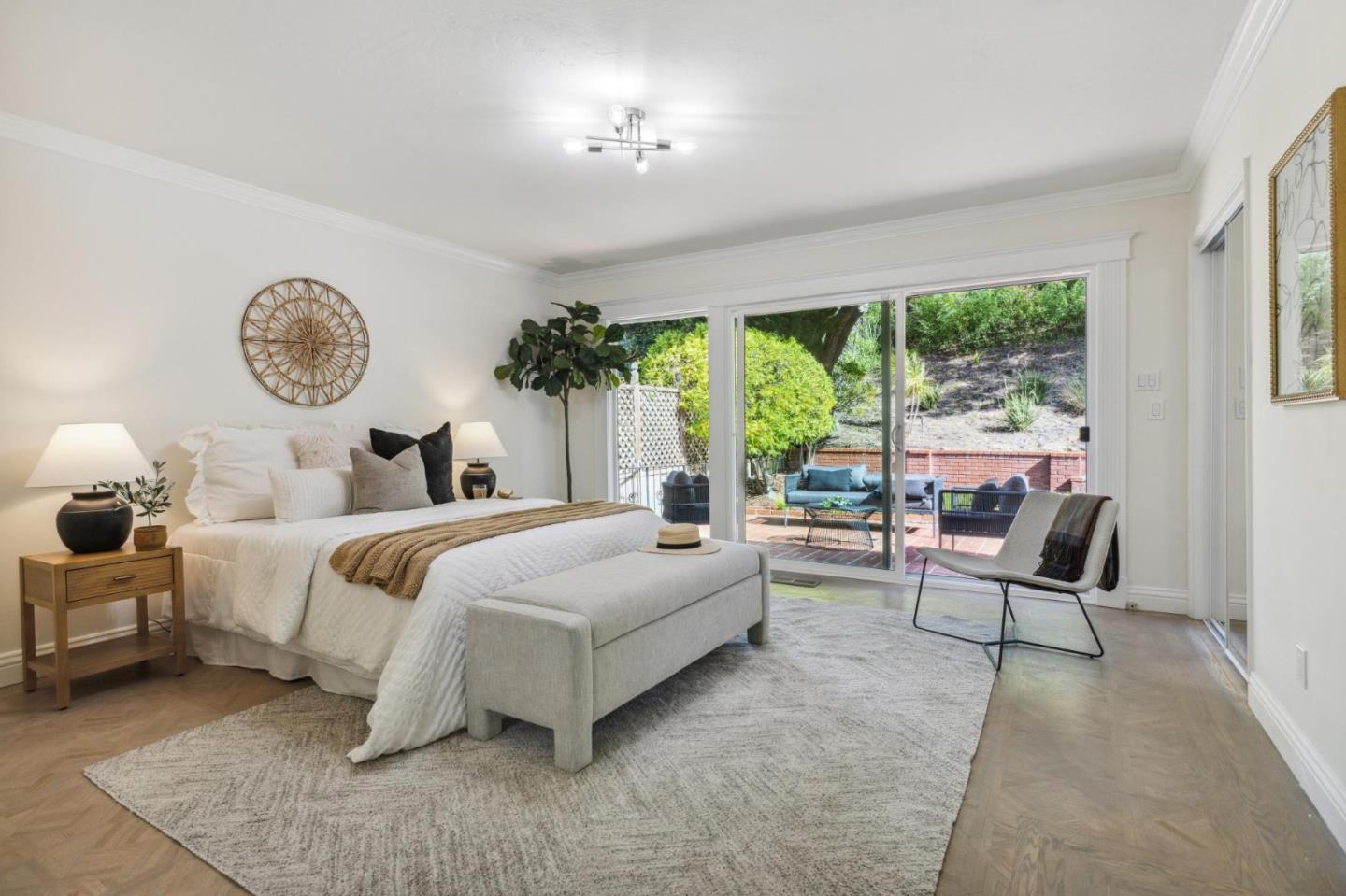 1225 Roble Road Millbrae, CA 94030 - Photo 23 of 42 a bedroom with bed and a large window