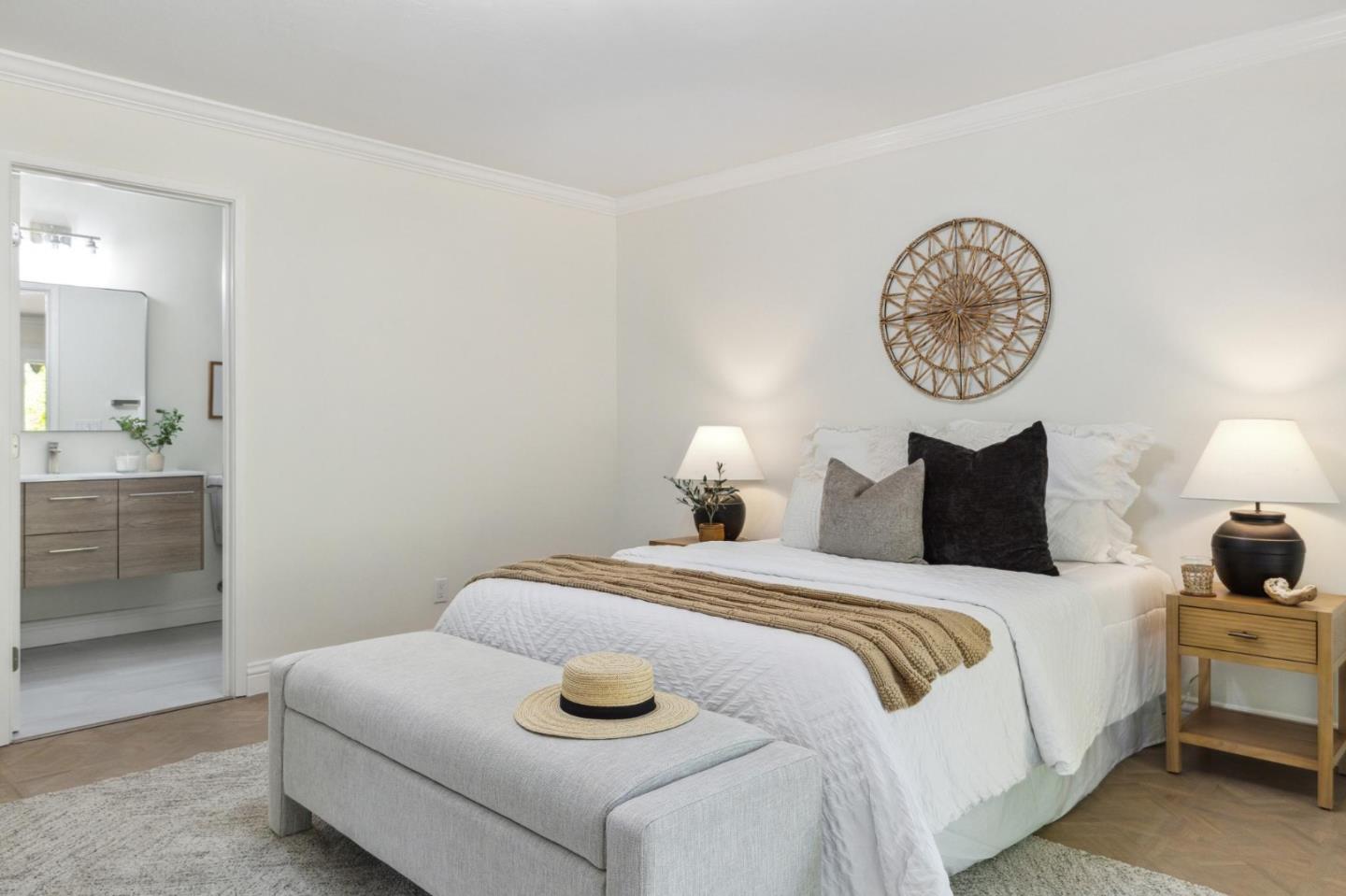 1225 Roble Road Millbrae, CA 94030 - Photo 25 of 42 a bedroom with a bed and a chandelier