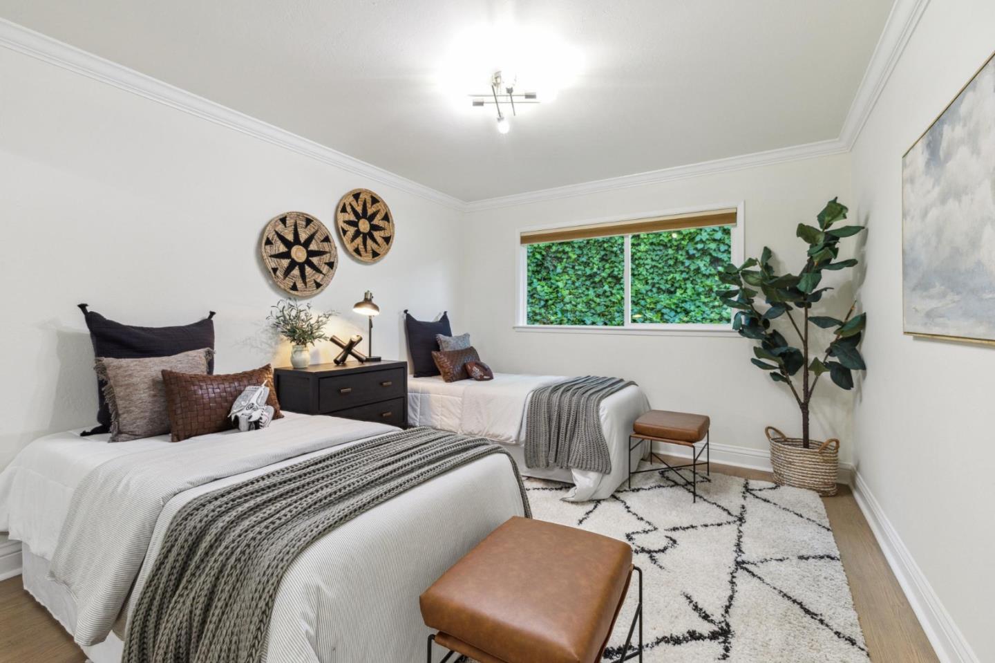1225 Roble Road Millbrae, CA 94030 - Photo 29 of 42 a bedroom with furniture and a large window