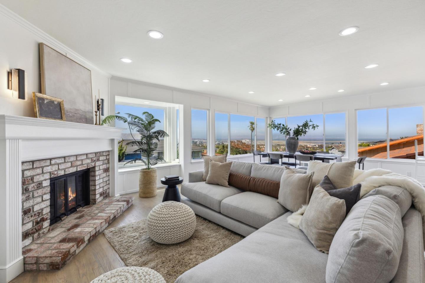 1225 Roble Road Millbrae, CA 94030 - Photo 4 of 42 a living room with furniture and a fireplace
