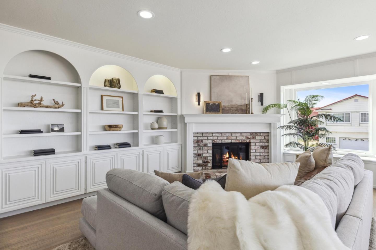 1225 Roble Road Millbrae, CA 94030 - Photo 10 of 42 a living room with furniture fireplace and wooden floor