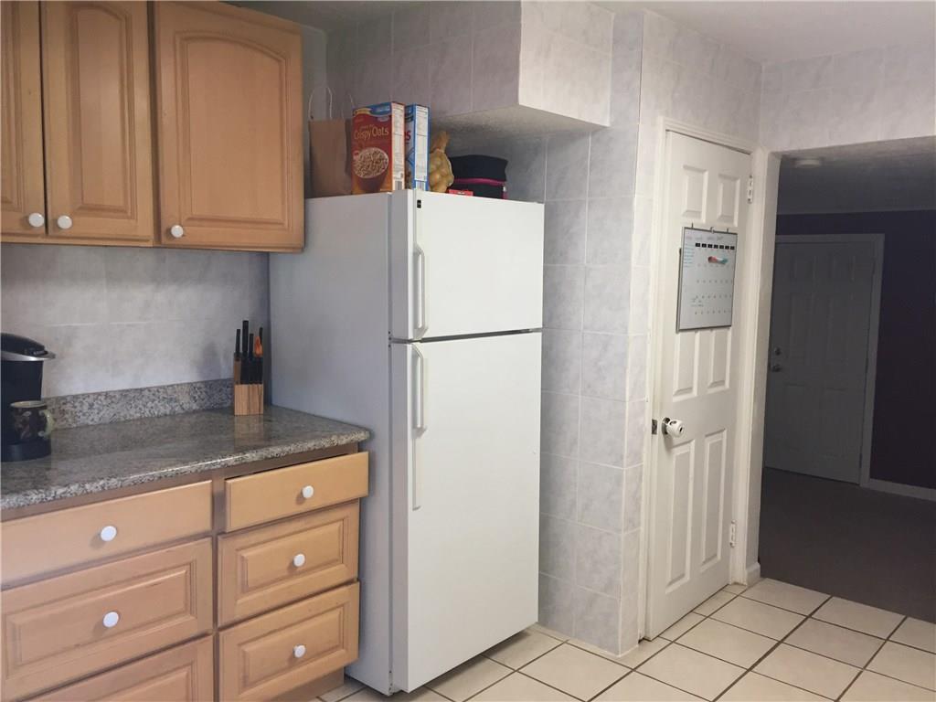 1 Fenway Road Pittsburgh, PA 15209 - Photo 8 of 25 KITCHEN WITH ENTRANCE TO FAMILY ROOM AND BASEMENT