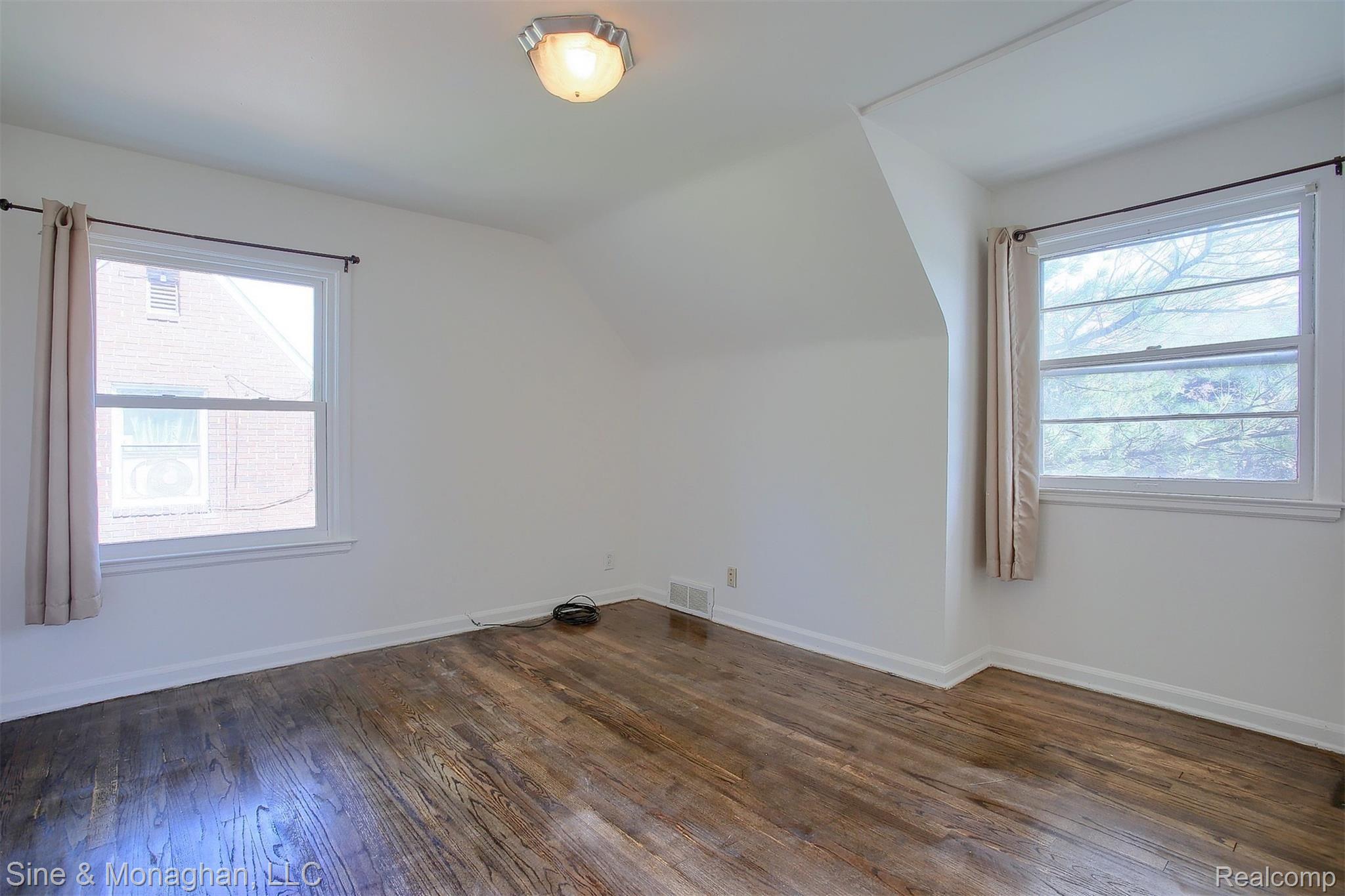 22200 Moross Road Grosse Pointe, MI 48236 - Photo 19 of 25 23-2nd-Unit-Master-Bedroom.jpg
