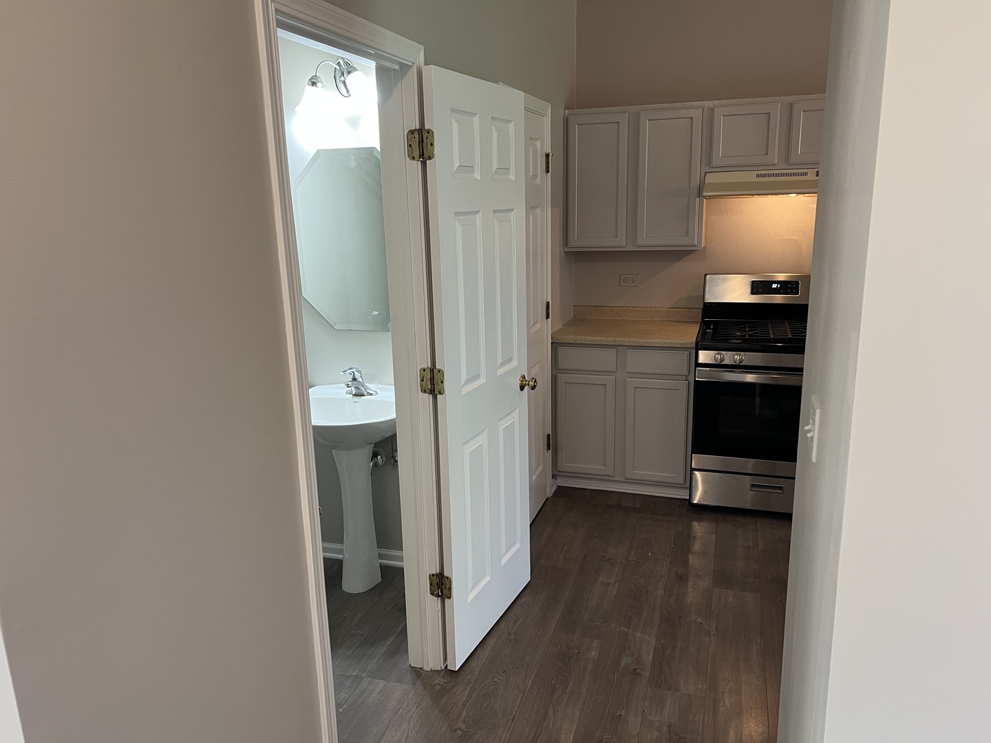 3044 Troon Drive Montgomery, IL 60538 - Photo 14 of 20 a kitchen with a refrigerator and a stove top oven