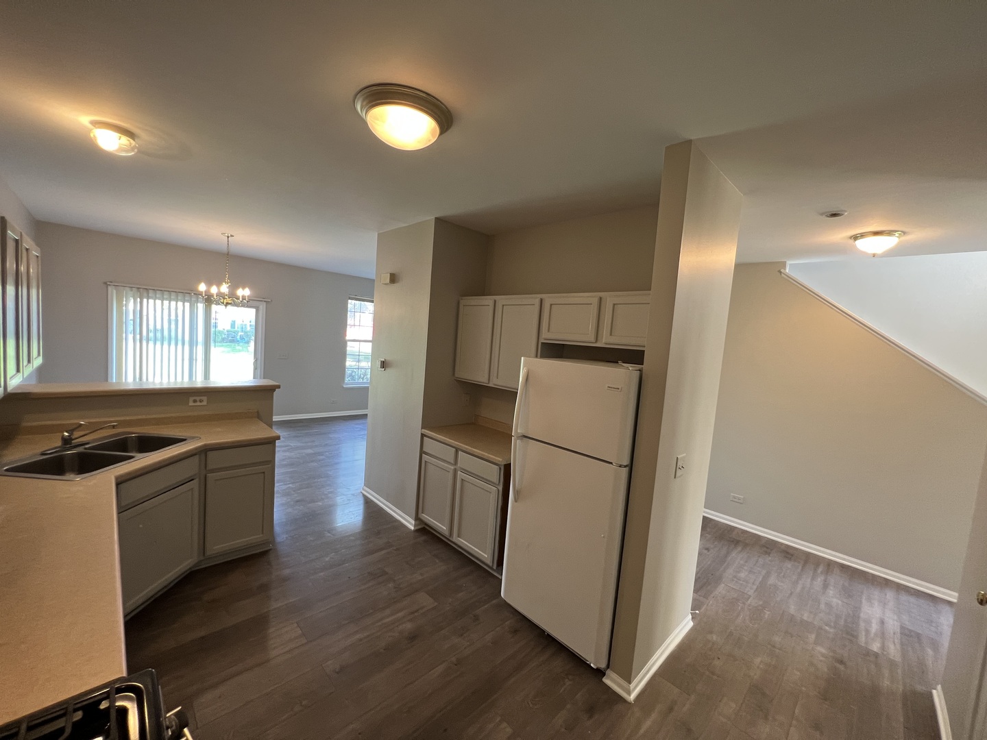 3044 Troon Drive Montgomery, IL 60538 - Photo 15 of 20 a kitchen with a refrigerator a sink and a stove