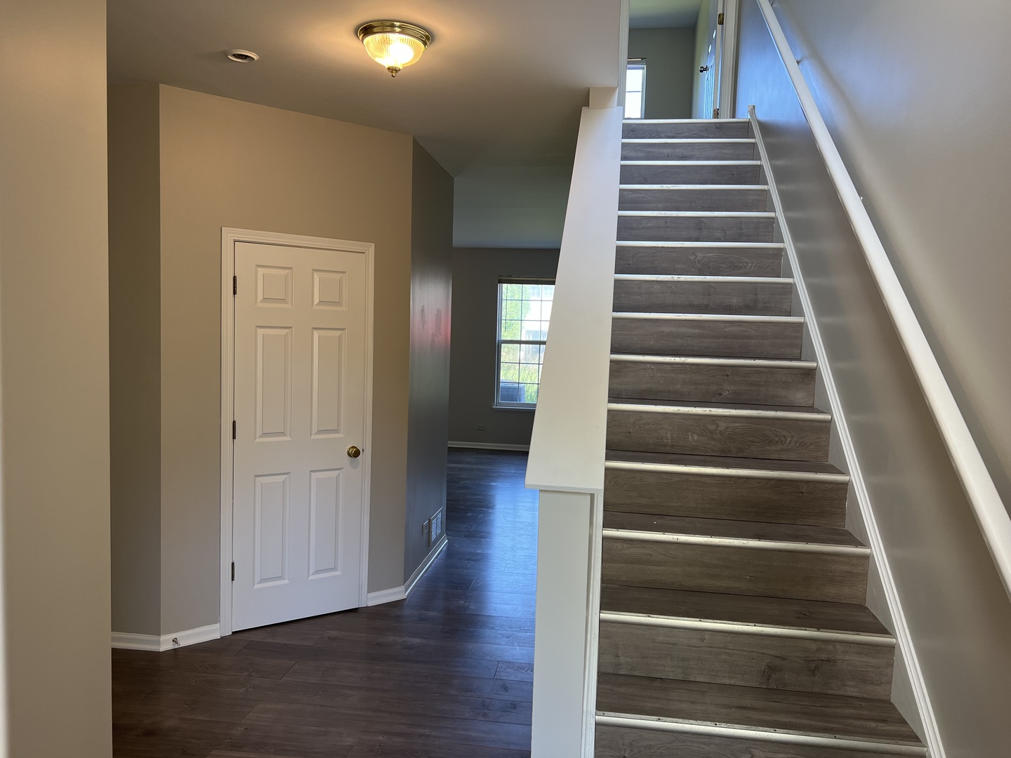 3044 Troon Drive Montgomery, IL 60538 - Photo 2 of 20 a view of an entryway with wooden floor