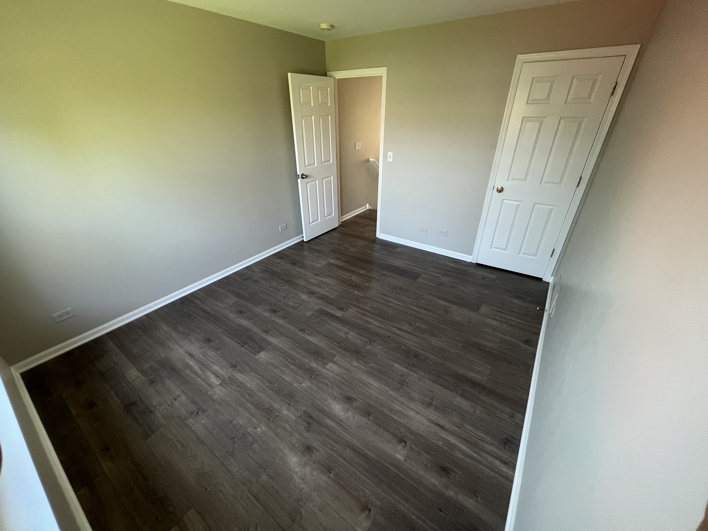 3044 Troon Drive Montgomery, IL 60538 - Photo 5 of 20 an empty room with wooden floor