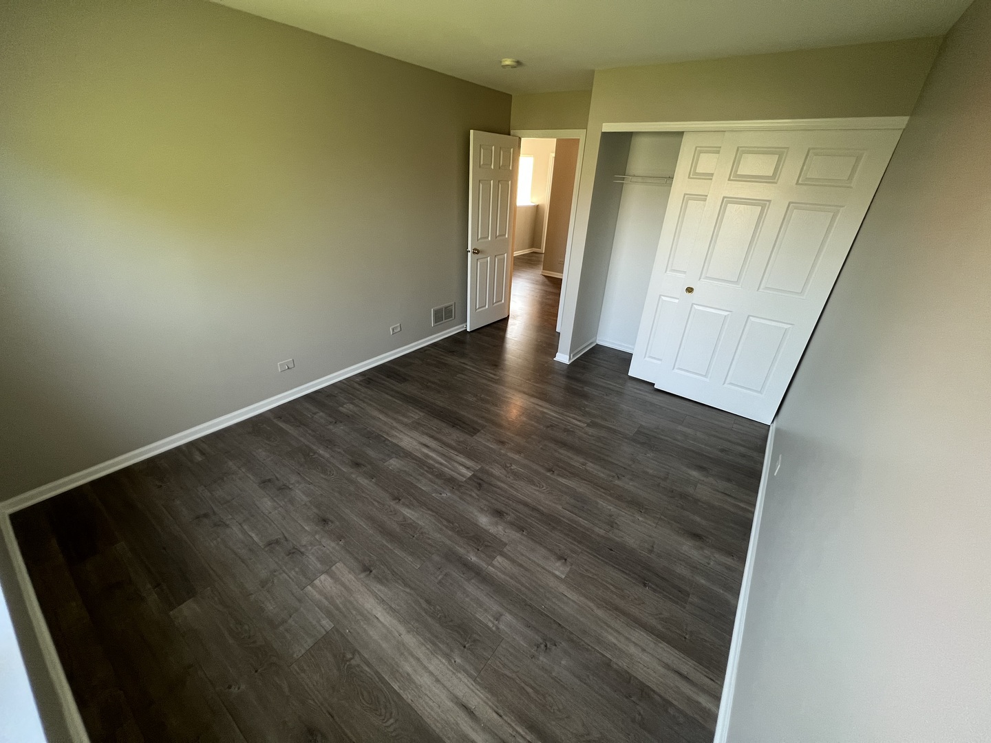 3044 Troon Drive Montgomery, IL 60538 - Photo 9 of 20 an empty room with wooden floor and closet