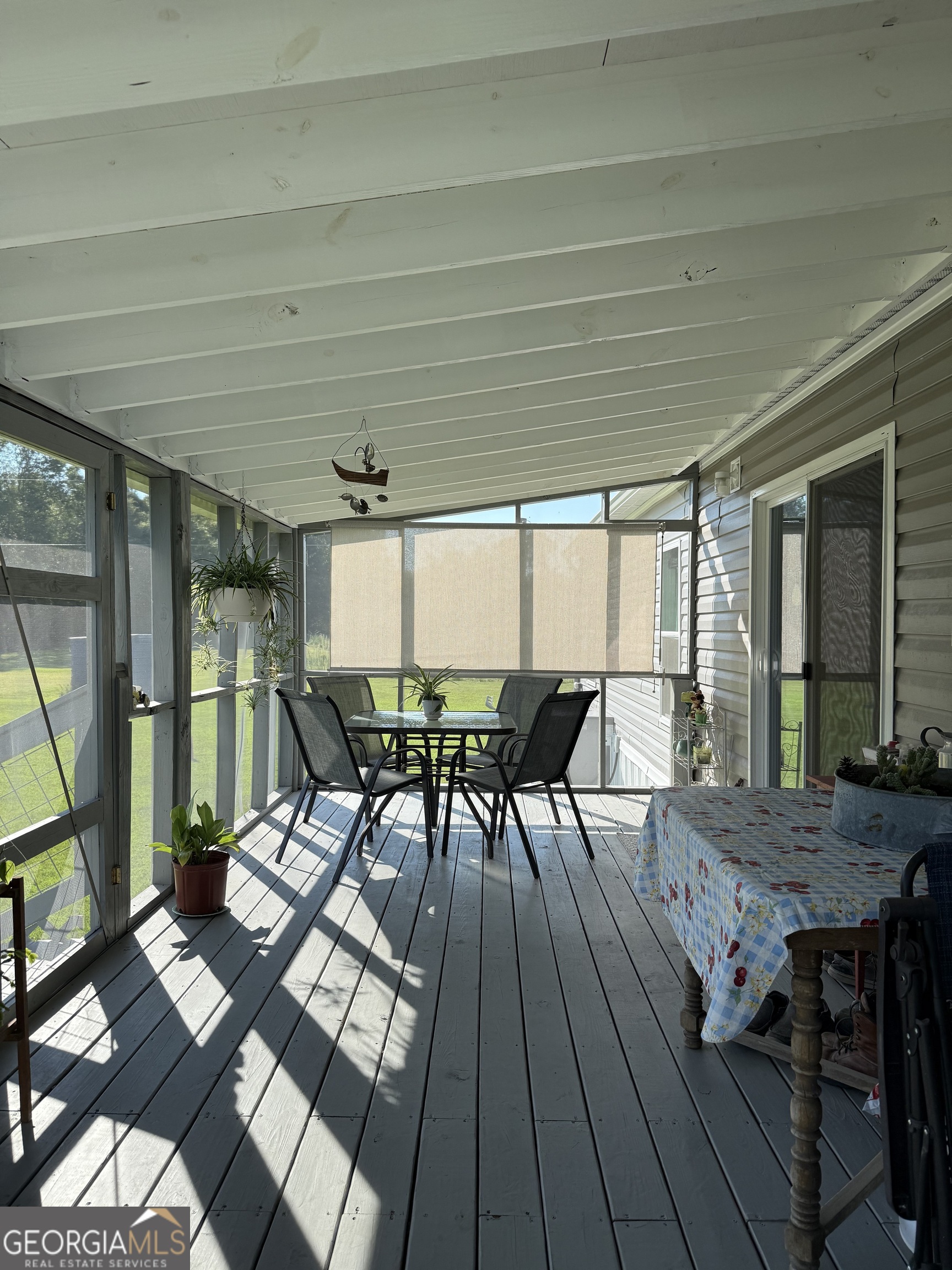 1430 Old Poor Robin Road Sylvania, GA 30467 - Photo 20 of 30 a dining room with furniture and wooden floor