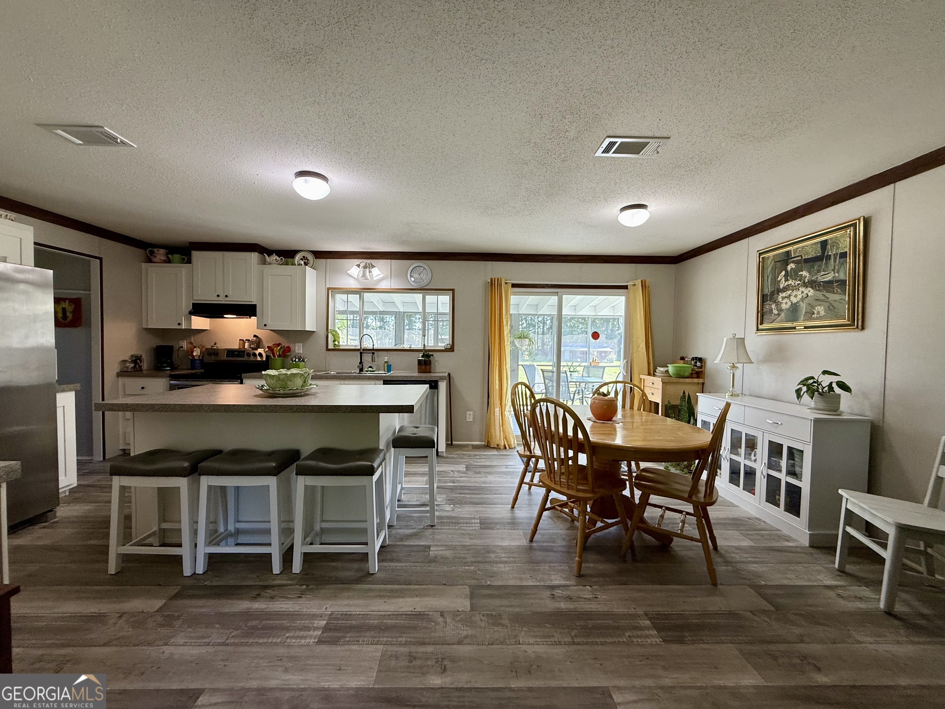 1430 Old Poor Robin Road Sylvania, GA 30467 - Photo 2 of 30 a dining room with furniture and window